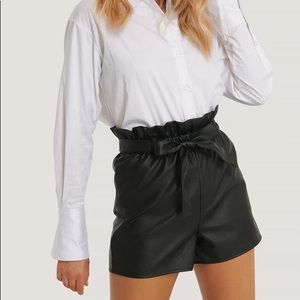 NA-KD high waisted faux leather shorts